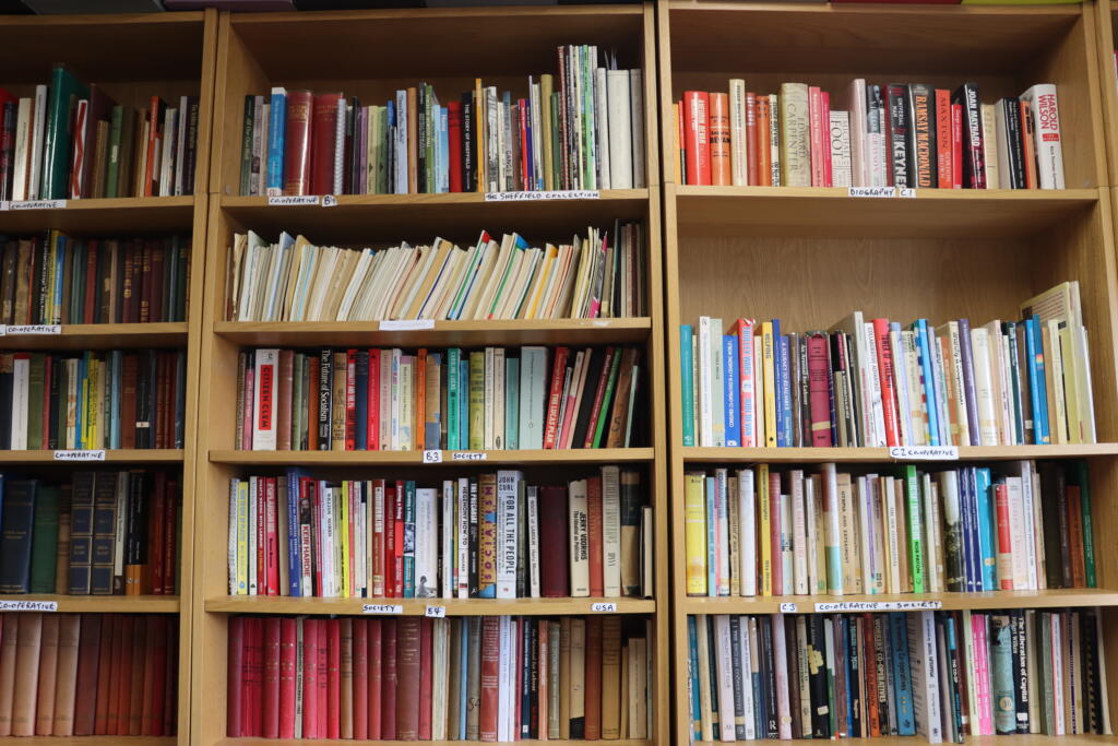 Shelves of books in the Principle 5 library